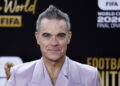 Robbie Williams da record, supera i Beatles per numero di album al primo posto